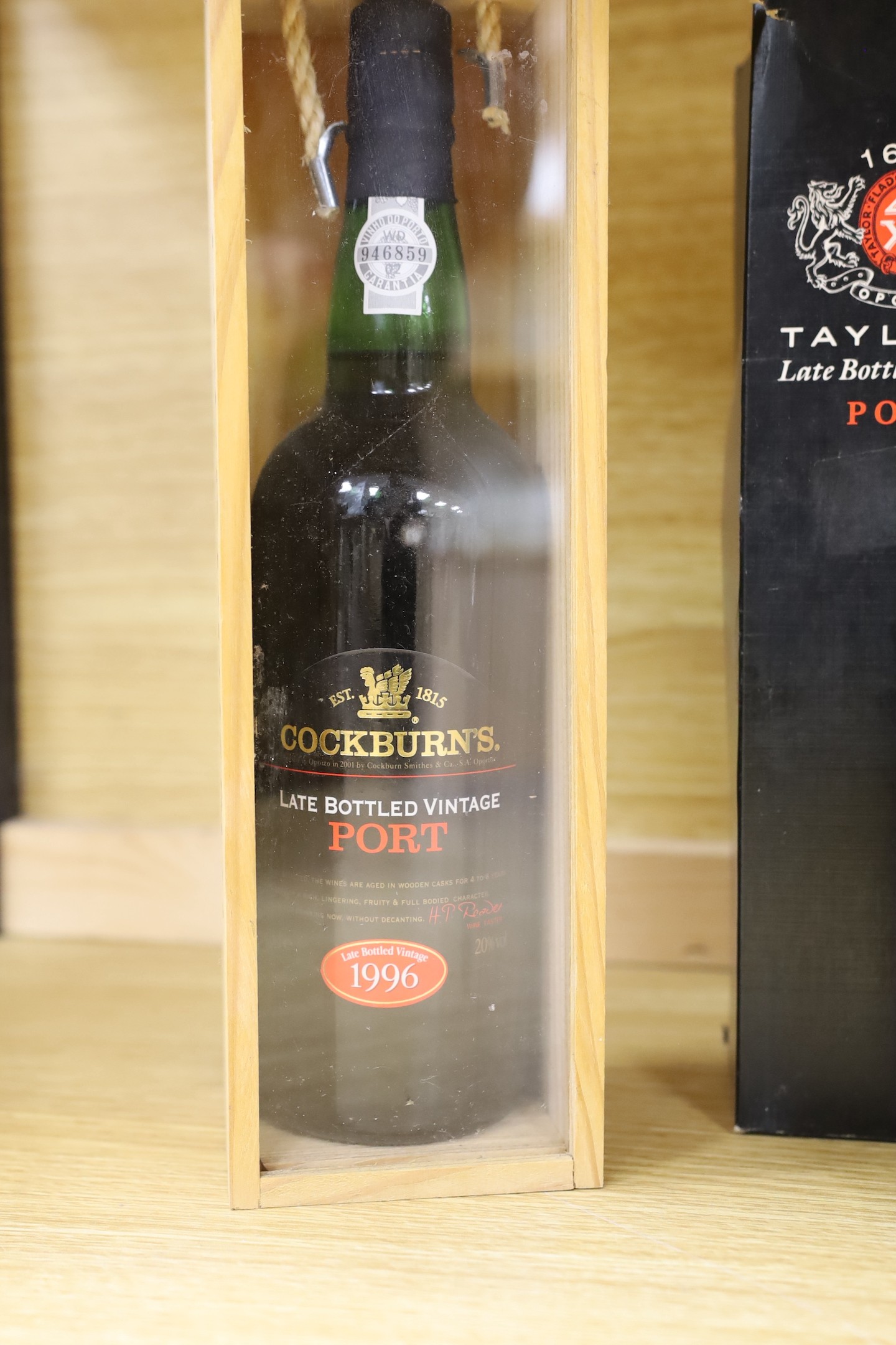 A cased 1996 bottle of vintage Cockburn’s port, together with seven other bottles of various port